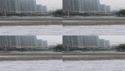 下雪天的城市道路高清在线视频素材下载