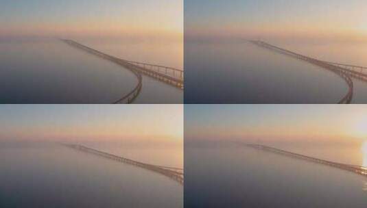 4k航拍山东青岛胶州湾跨海大桥日出高清在线视频素材下载