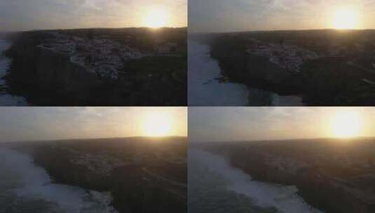 日出大西洋鸟瞰葡萄牙阿泽尼亚斯杜马尔村高清在线视频素材下载