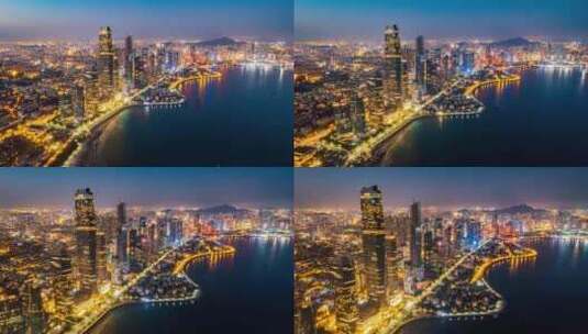 中国山东青岛海边城市夜景延时航拍高清在线视频素材下载