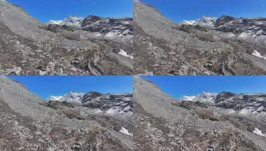 四川阿坝航拍攀登岷山山脉四根香峰的登山者高清在线视频素材下载
