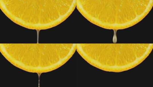 橙汁从一片橙子里滴出特写高清在线视频素材下载