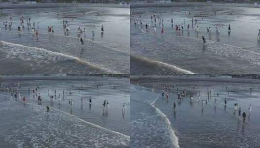 原创log航拍黄昏沙滩上玩耍的人4K-8高清在线视频素材下载