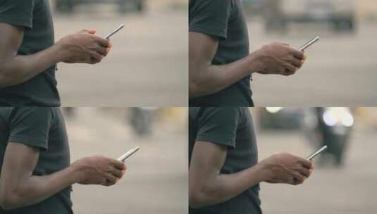 黑人在智能手机上打字的手高清在线视频素材下载