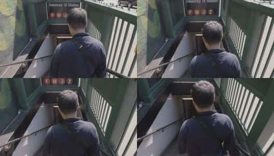 走在纽约地铁口的男士高清在线视频素材下载