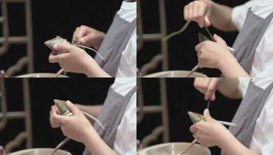手工包制粽子的儿童特写高清在线视频素材下载