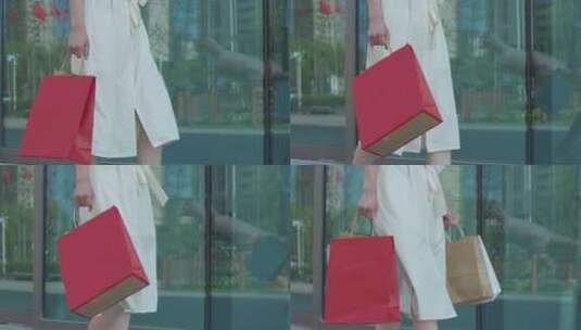 中国女性在商场购物手拎购物袋步行高清在线视频素材下载