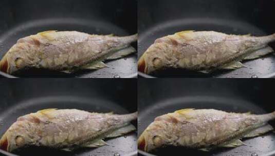 厨房不粘锅煎锅煎鱼炒鱼翻鱼高清在线视频素材下载