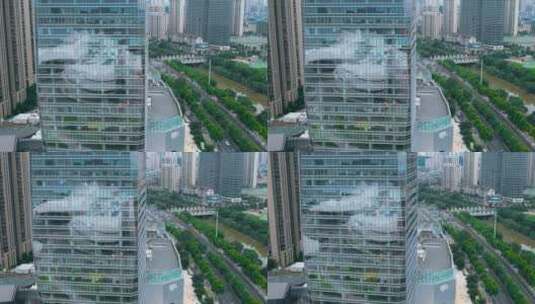 4K航拍城市高楼大厦蜘蛛人琉璃外墙卫生实拍高清在线视频素材下载