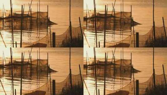 夕阳下小渔村的河水江水水面视频素材高清在线视频素材下载