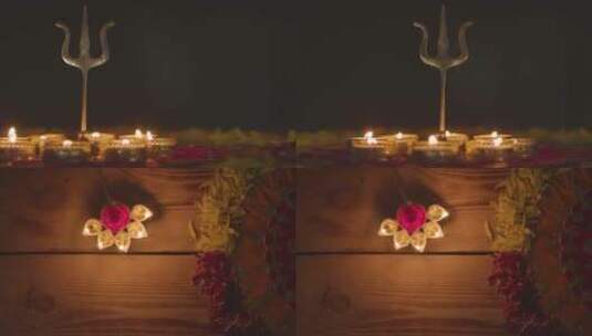 寺庙大殿内供桌上点的蜡烛和祭品高清在线视频素材下载