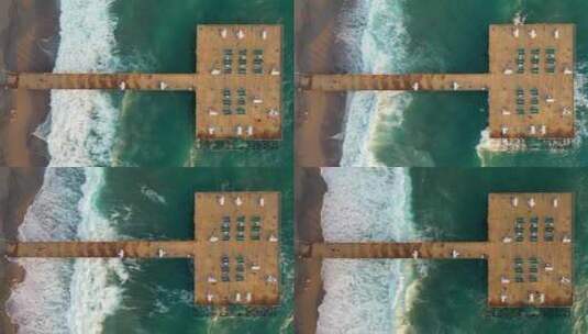 日落时用无人机拍摄的海上风暴高清在线视频素材下载
