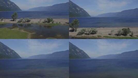 山脉旁湖泊的航拍高清在线视频素材下载