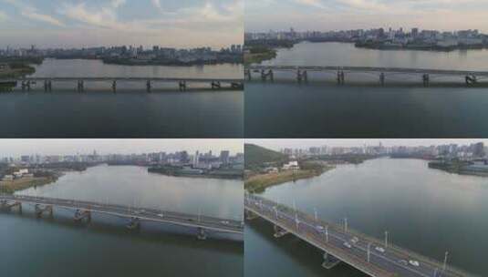 航拍武汉东湖皮划艇桥车流高清在线视频素材下载