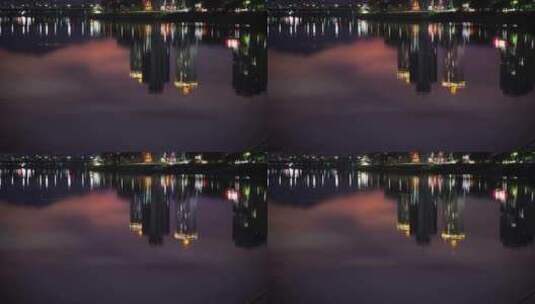 傍晚城市建筑水面倒影晚霞风光江滨湖面美景高清在线视频素材下载