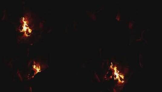 人们围坐在篝火旁围成一圈高清在线视频素材下载