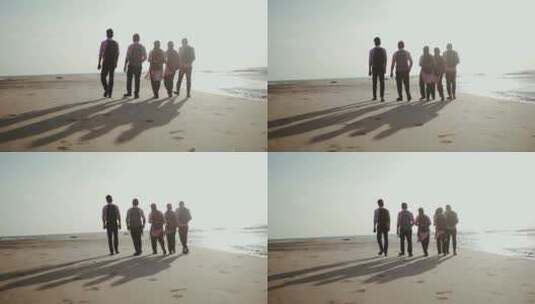 五个人在海边散步的背影高清在线视频素材下载