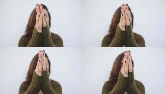 女人双手合十祈祷高清在线视频素材下载