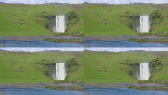 冰岛美丽的瀑布从悬崖上坠落高清在线视频素材下载