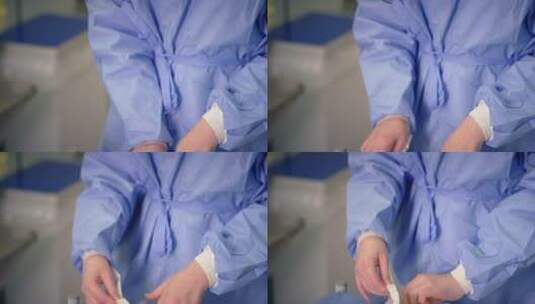女医生带上手术手套高清在线视频素材下载