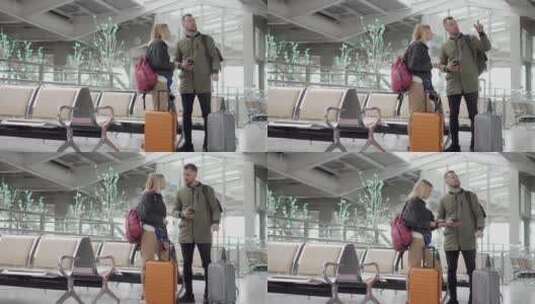 一男一女在机场交谈高清在线视频素材下载