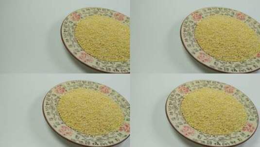 白底五谷杂粮黄金米黄米高清在线视频素材下载