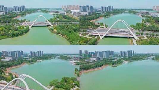 航拍郑州天健湖 城市公园 桥梁高清在线视频素材下载