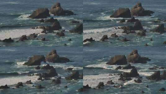 海浪撞击海滩上的岩石高清在线视频素材下载