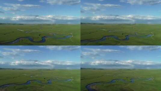航拍碧绿草原蓝色的河流高清在线视频素材下载
