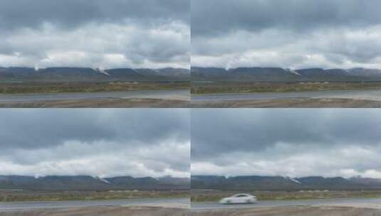 多云天气下的格尔木玉珠峰及京拉公路延时高清在线视频素材下载