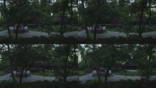 旅游景区 航拍苏州拙政园 夏亭 隔树左移高清在线视频素材下载