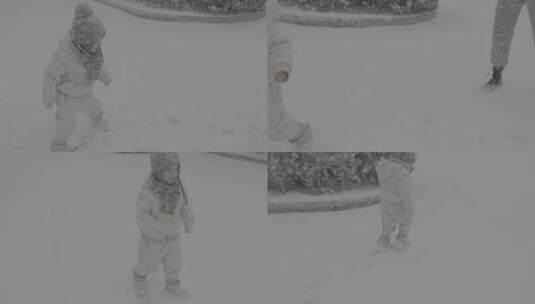 小孩在雪地里围着妈妈转slog 10bit422高清在线视频素材下载