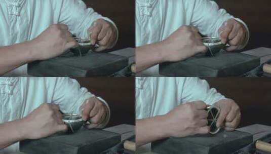 手工艺视频手工匠人锻银麻线捆扎银圈慢镜头高清在线视频素材下载