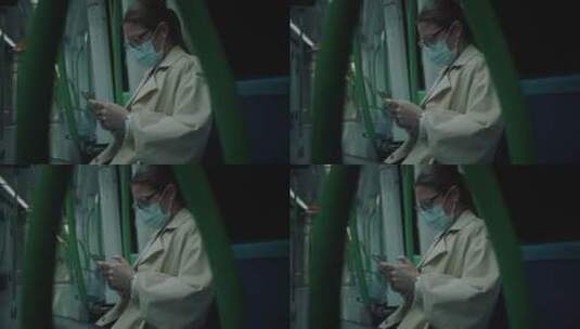 地铁上玩手机的女人高清在线视频素材下载