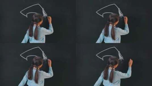 小学生在黑板上画博士帽高清在线视频素材下载