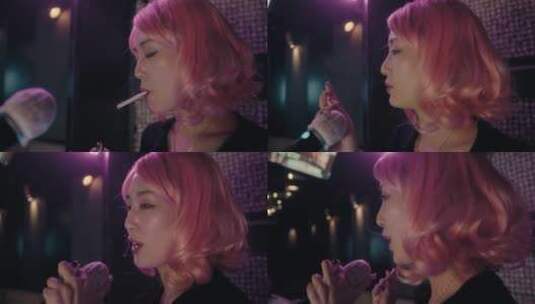 女人抽烟后唱卡拉OK高清在线视频素材下载