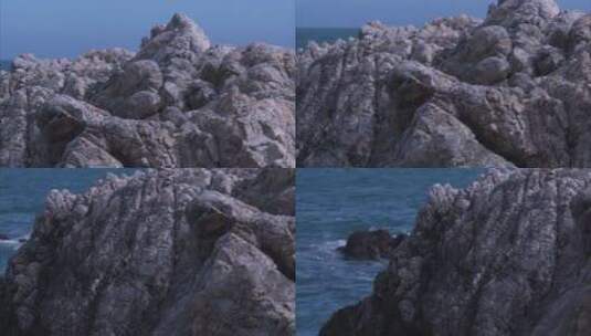 海边巨大的岩石特写 摇高清在线视频素材下载