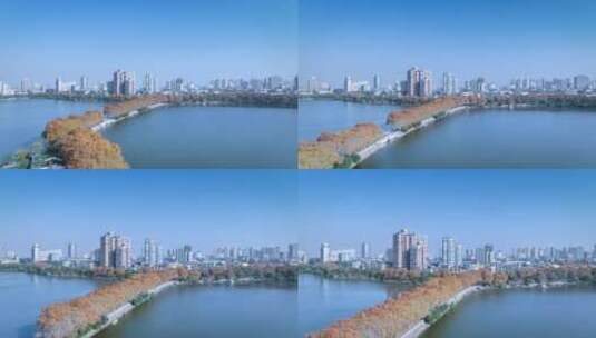 江西省九江市李公堤及城景在深秋的航拍延时高清在线视频素材下载