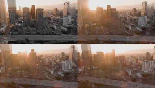 航拍洛杉矶日出阳光照射摩天大楼汽车车流高清在线视频素材下载