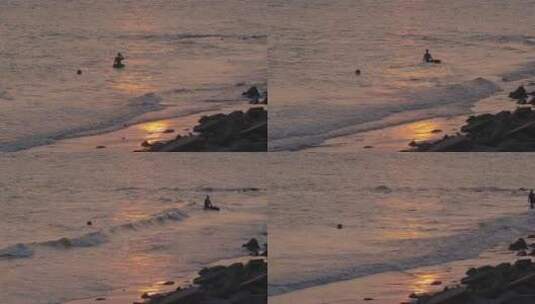 夕阳下一个人在海里游泳高清在线视频素材下载