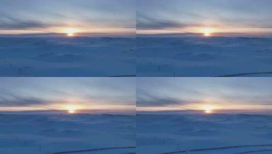 航拍4K冬日冰雪覆盖的草原暮色高清在线视频素材下载