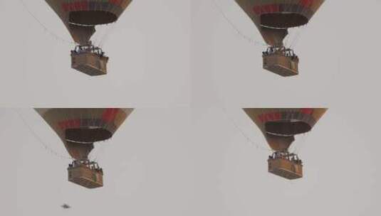 人们乘坐热气球飞行高清在线视频素材下载