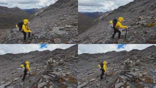 攀登贡嘎山卫峰乌库楚雪山的登山者徒步行进高清在线视频素材下载