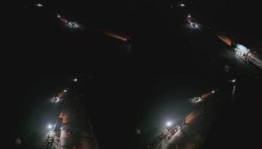 航拍山东省威海市双岛湾公路桥扩建夜间施工高清在线视频素材下载