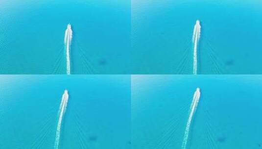 航拍海南三沙市西沙海洋蔚蓝色大海与游艇高清在线视频素材下载