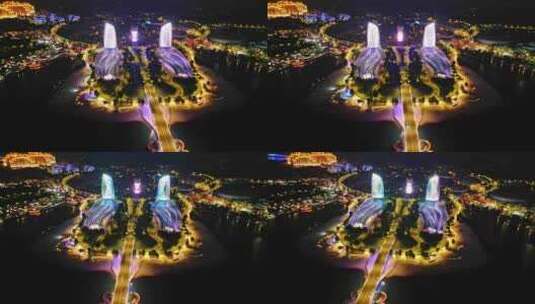 海南儋州海花岛城市建筑城市建筑夜景灯光秀高清在线视频素材下载