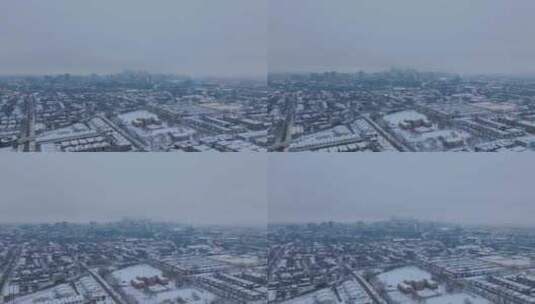 航拍大雪后的城镇高清在线视频素材下载