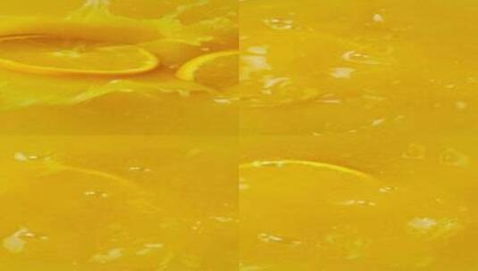 橙子掉入橙汁慢镜特写高清在线视频素材下载
