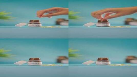 手从药瓶中取出欧米茄3片的垂直视频高清在线视频素材下载