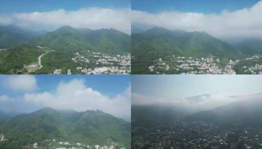航拍城市清晨山间云雾缭绕高清在线视频素材下载